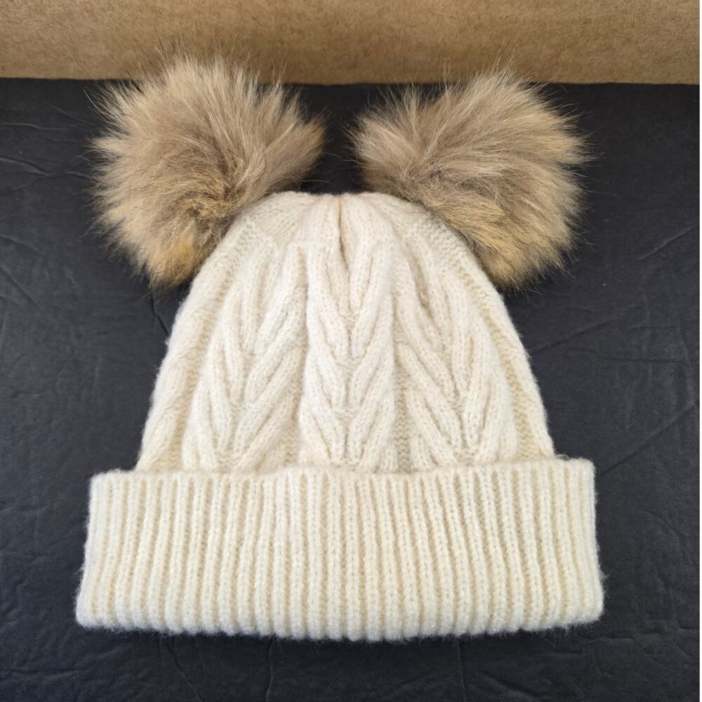 Steve Madden cream cable knit beanie with double faux-fur pom-poms